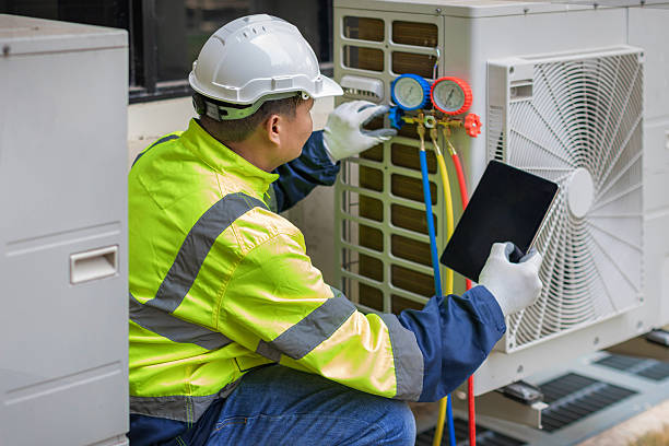 Professional Heat Pump Repair technician working in Cramerton, NC